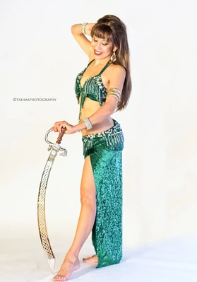 Captivate your guests with the ancient art of Belly Dancing! Our Dallas belly dancers will make your event unforgettable.